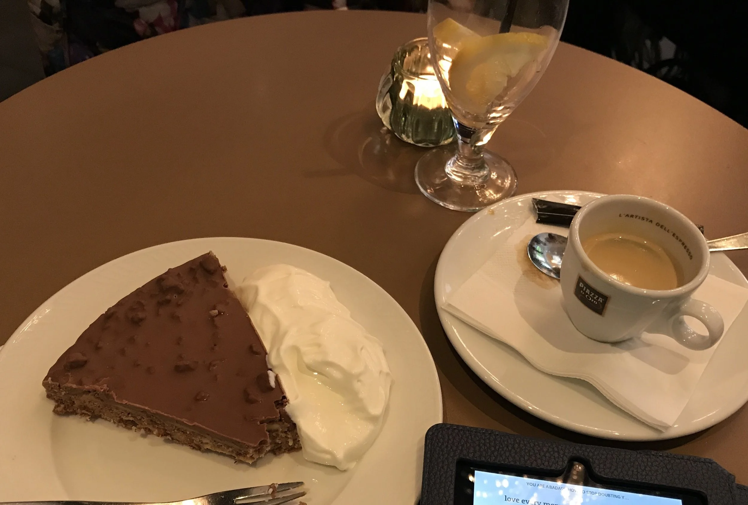Espresso, my Kindle, and a mega slice of Daim -bar flavored cake with cream. That cake was delicious!