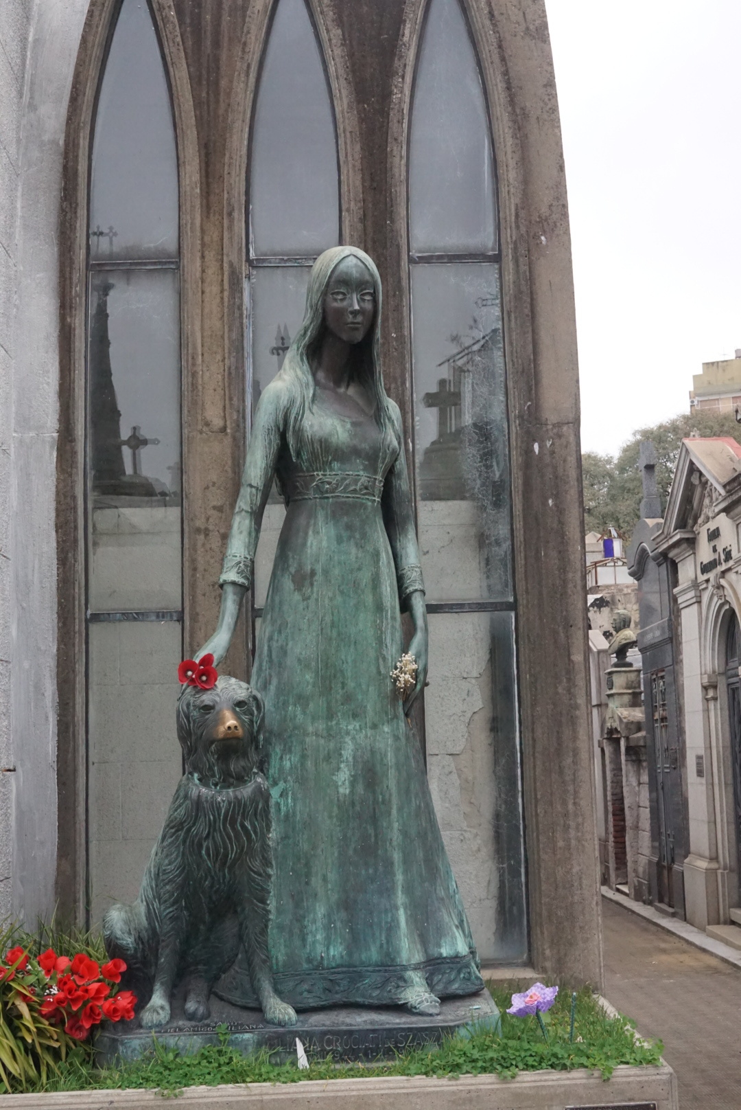 Pretty statue at the memorial of a very young person who died, in Recoleta.