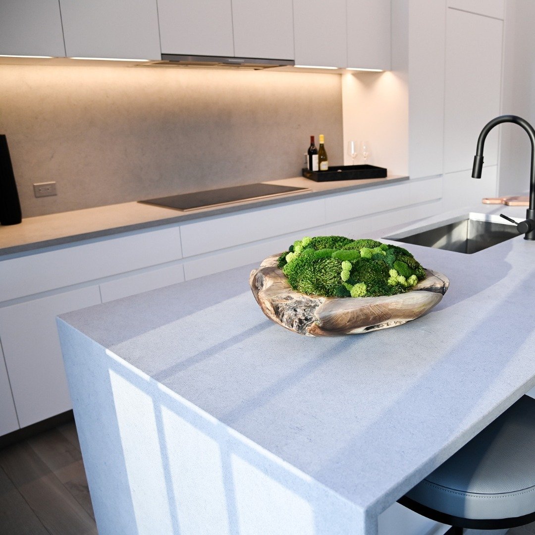 A harmonious blend of modern design and functionality, this kitchen is crowned by a stunning waterfall countertop.

#fairfieldcountydesign #designinspiration #designinspo #homedesign #housedesign #houseandhome #mynewengland #homeowner #connecticut #n