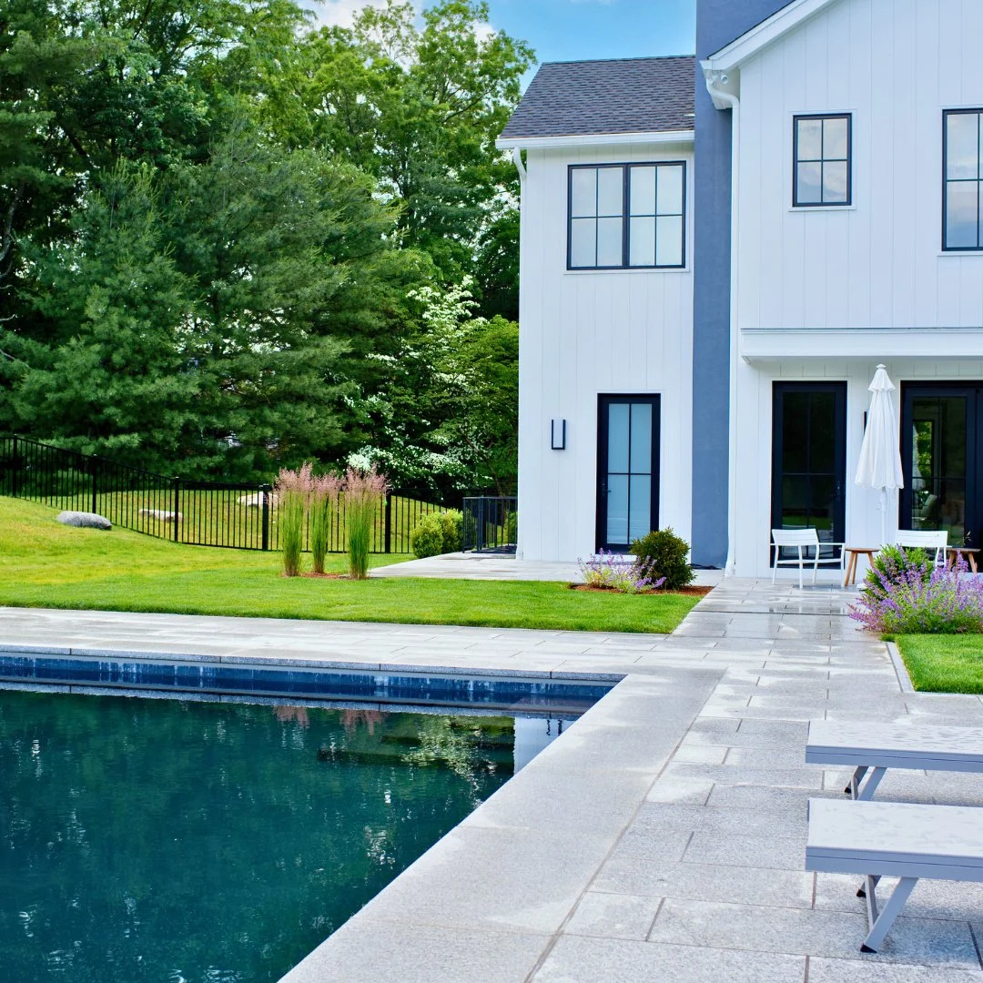 The perfect setting for pool days that turn into dinner parties. This Guilford Gray granite patio brings elegance and durability to every moment outdoors.