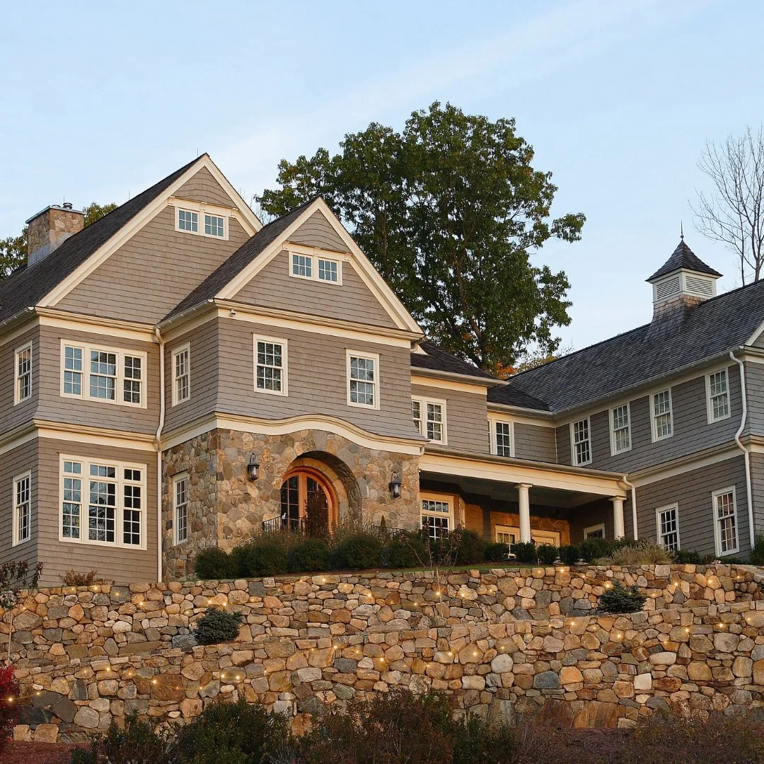Built into the landscape, not just on it. The texture and tone of native fieldstone adds timeless character - blending this home seamlessly with its surroundings, even in December&rsquo;s quiet light.