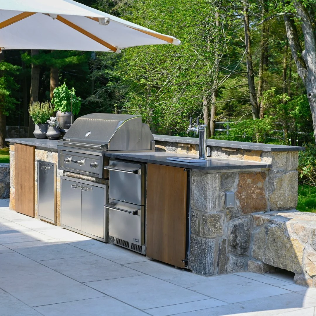 Stone walls, Olive Garden Limestone patios, and outdoor kitchens are once again the perfect backdrop for grilling and entertaining.