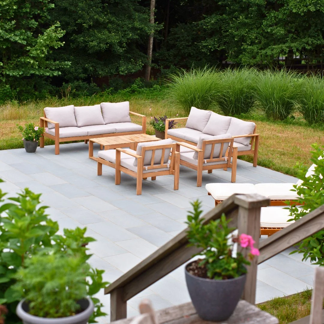 Set beneath the deck, this patio features Riverside Blue Porcelain for a clean, modern look that pairs perfectly with outdoor furniture and lush landscaping. Durable, low-maintenance, and designed to impress.