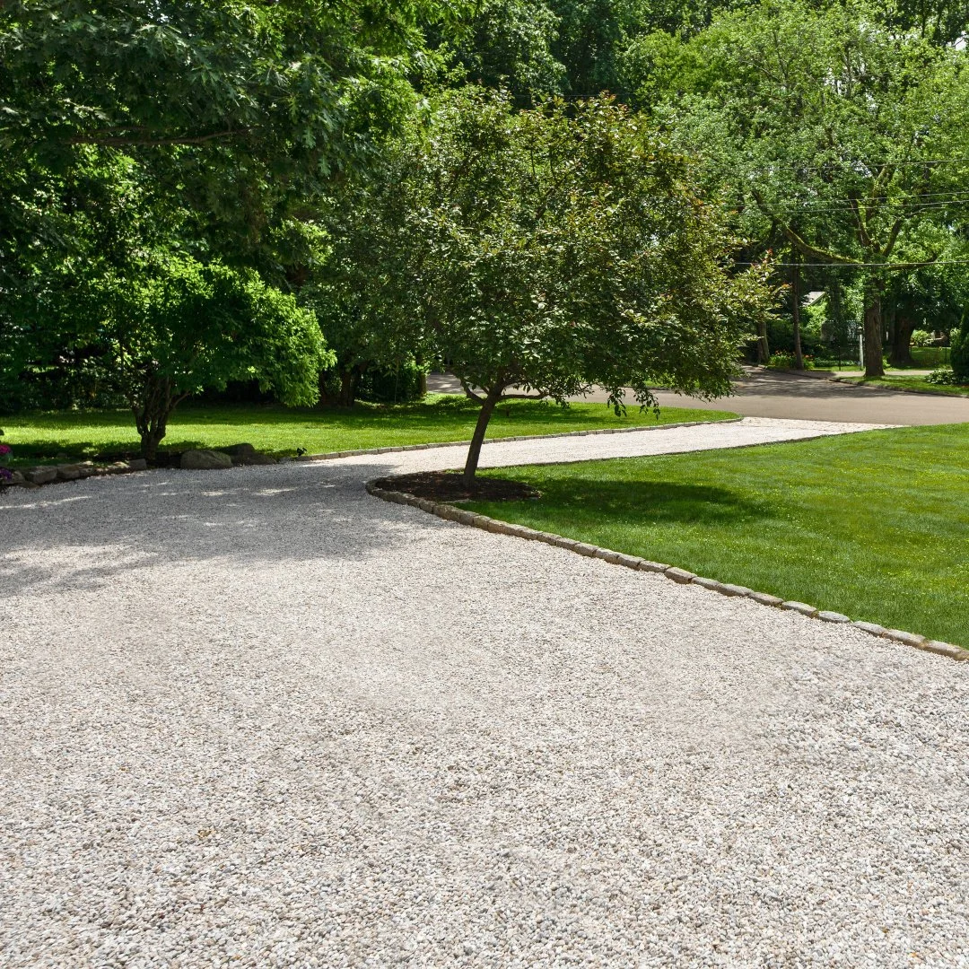 A welcome that starts at the curb.
This white stone gravel driveway offers a clean, classic look while providing durability and proper drainage. A simple upgrade that enhances both function and curb appeal from the moment you arrive.