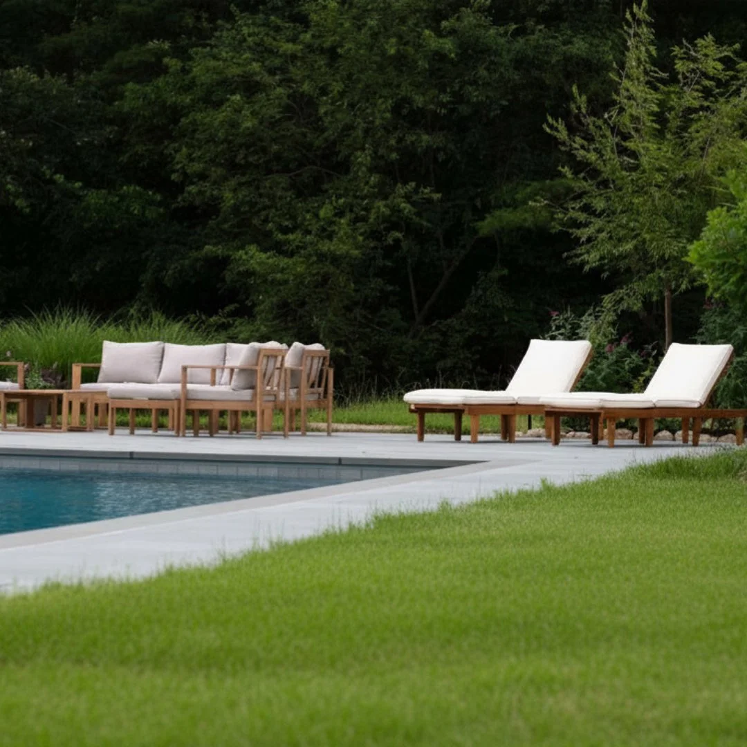 Poolside seclusion at its finest! The pool patio features our heat-resistant Riverside Blue porcelain pavers from The Gault Collection with bluestone pool coping.