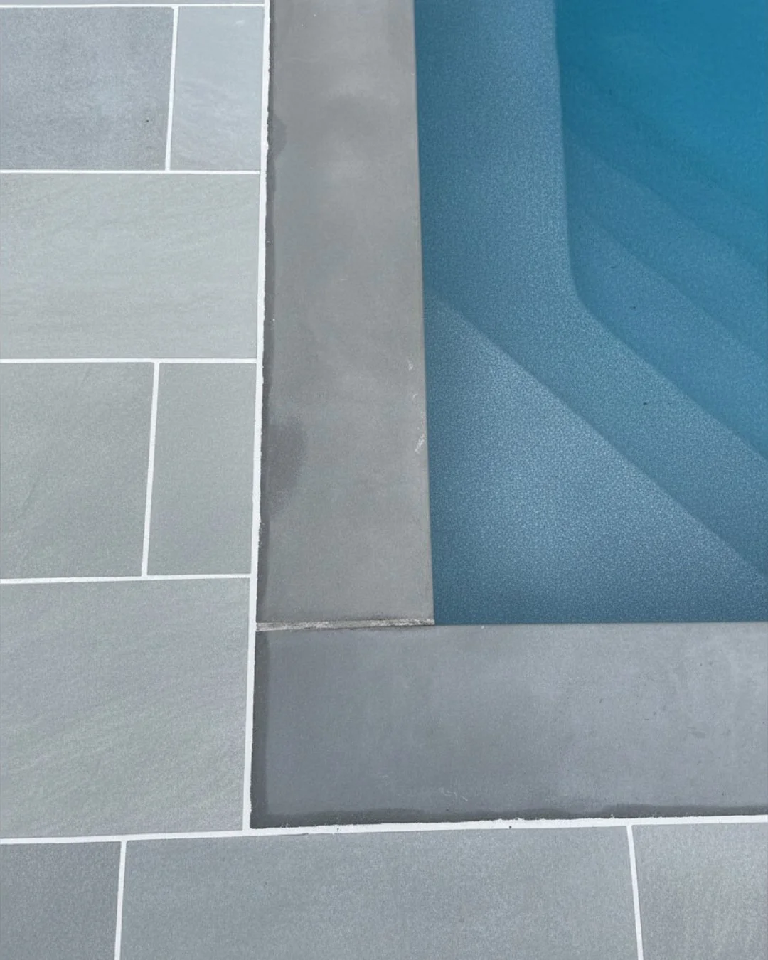 Fresh grout lines really bring out the texture of our Riverside Blue porcelain paver. Texture is just one of the many features that set The Gault Collection apart from other outdoor porcelain pavers.