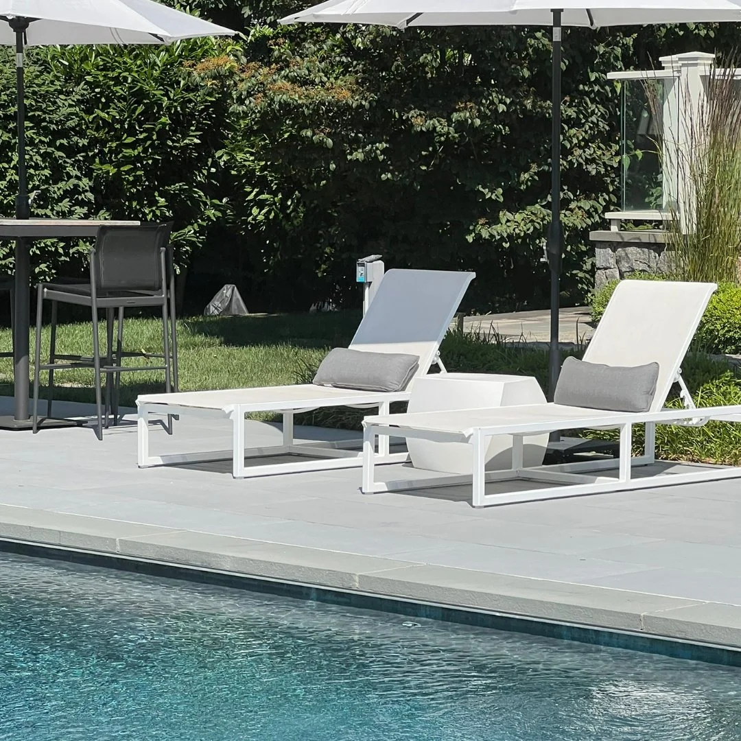 It's Memorial Day Weekend&hellip;there are no empty loungers in sight! But we can still admire the memory of these fresh white chairs on an outdoor porcelain patio with bluestone pool coping.