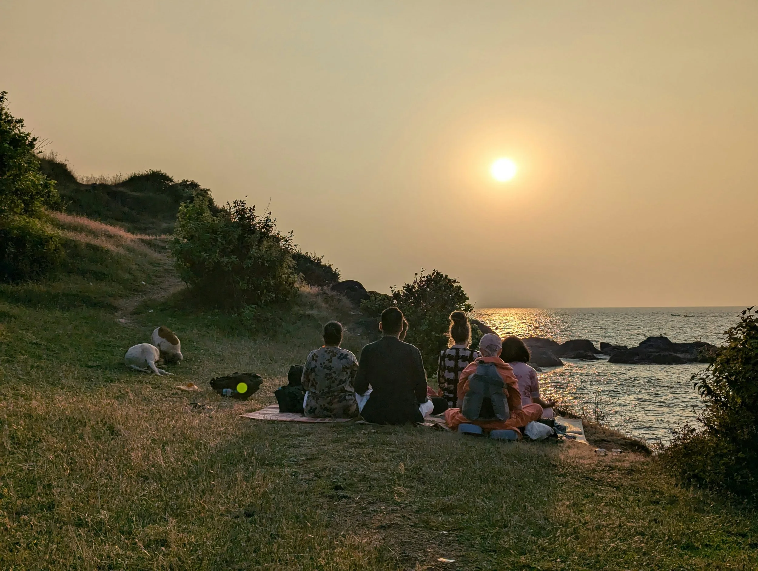 Person practicing mindfulness meditation outdoors for serenity