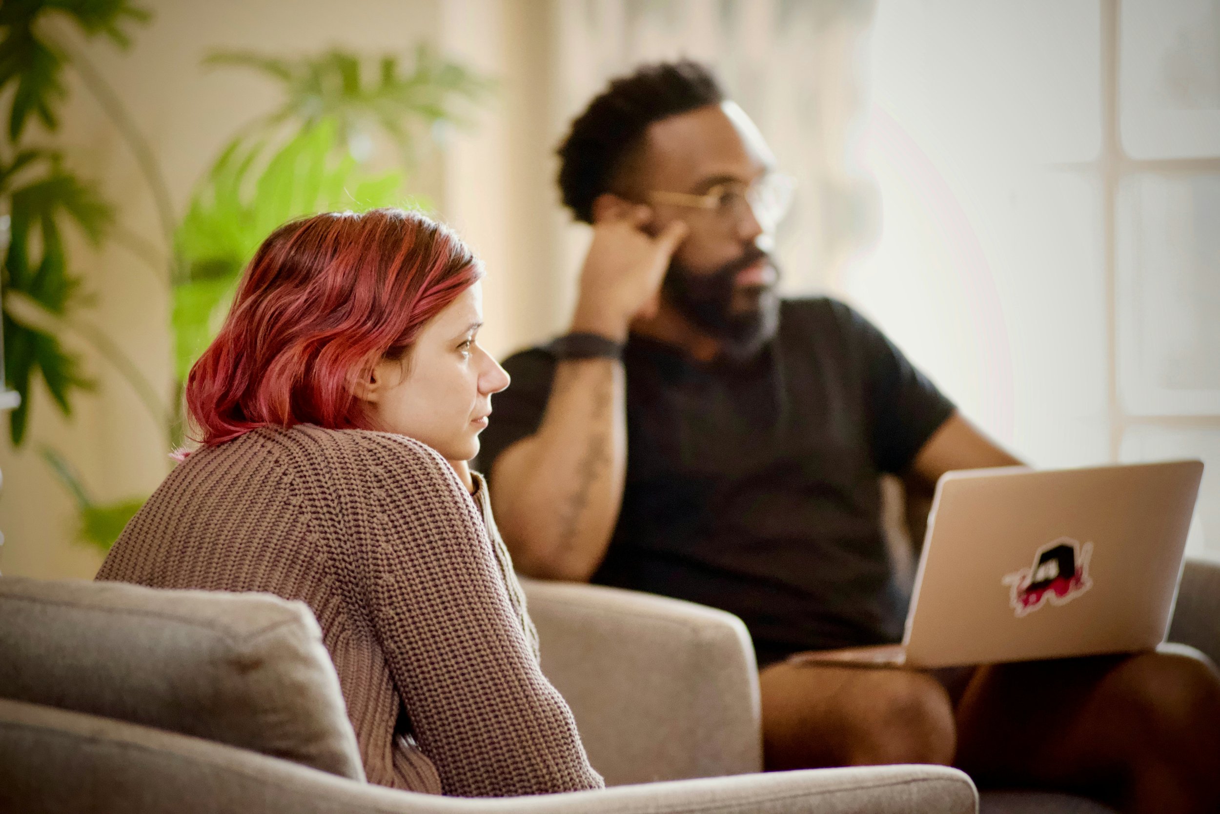 Image illustrating a couple attending online therapy