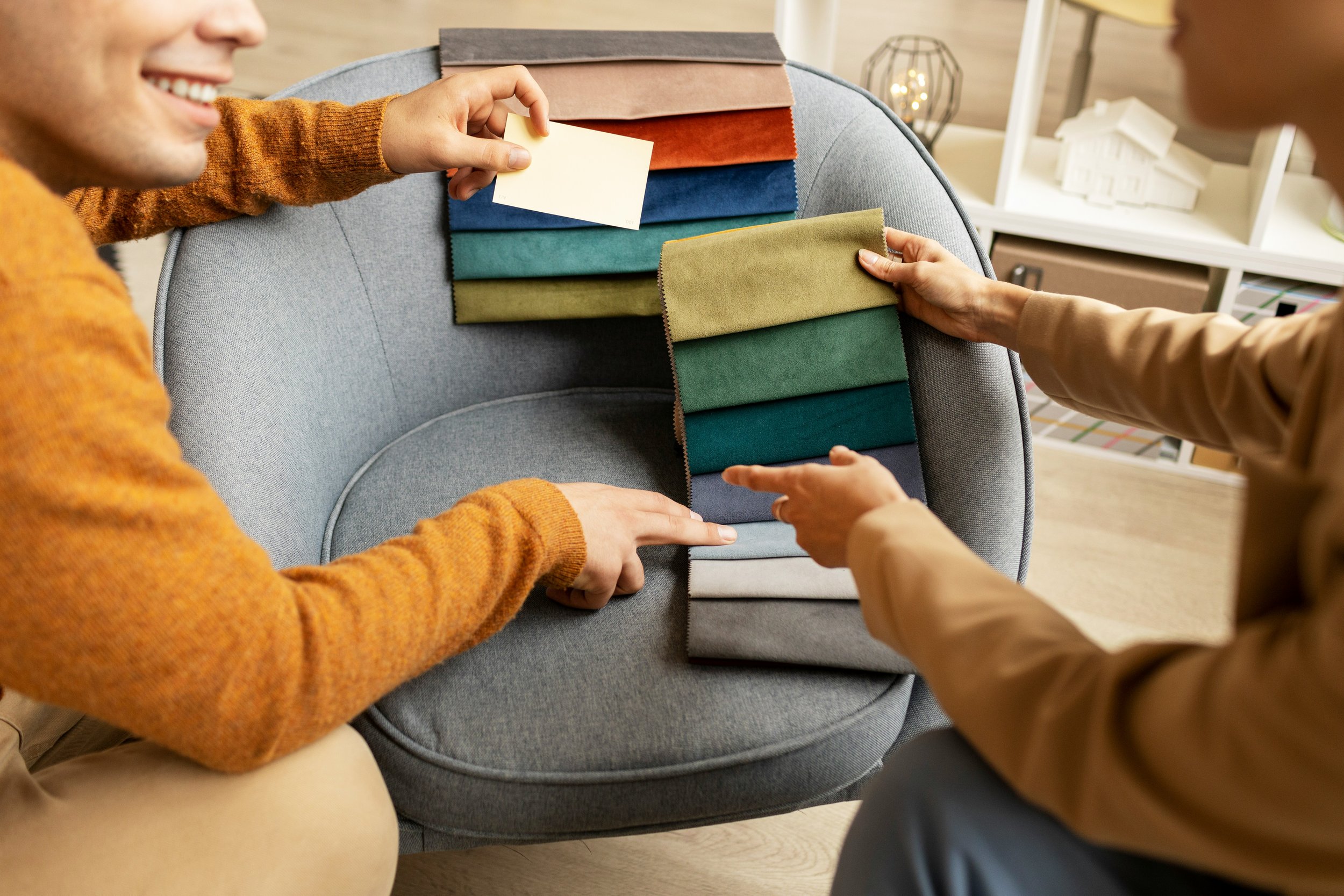 A couple browsing a marriage counseling book in a cozy living room