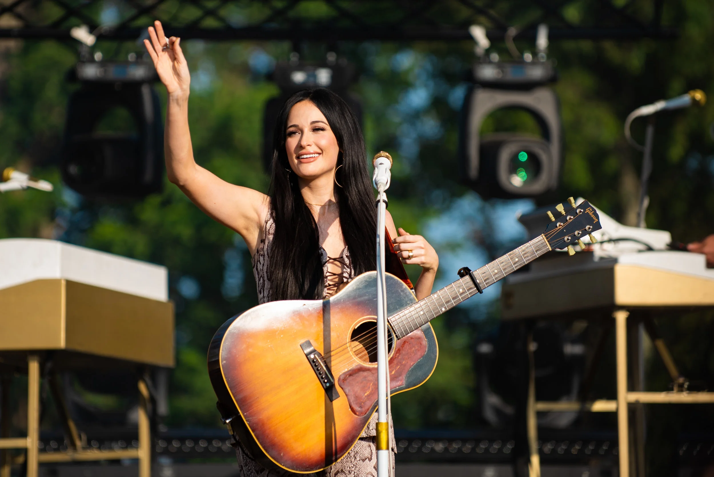  Kacey Musgraves waves to the crowd at the beginning of her set during FloydFest on Sunday, July 28, 2019. 