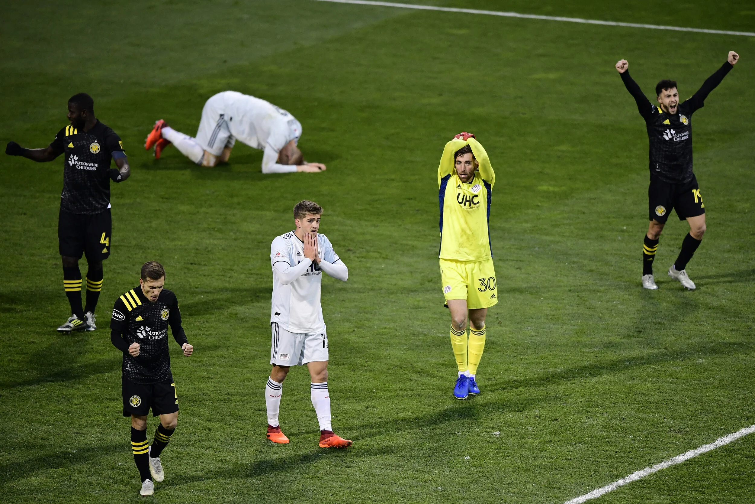  The New England Revolution and Columbus Crew react to the Columbus Crew's 1-0 win during the Eastern Conference Final of the MLS Cup Playoffs at MAPFRE Stadium on December 06, 2020 in Columbus, Ohio.  