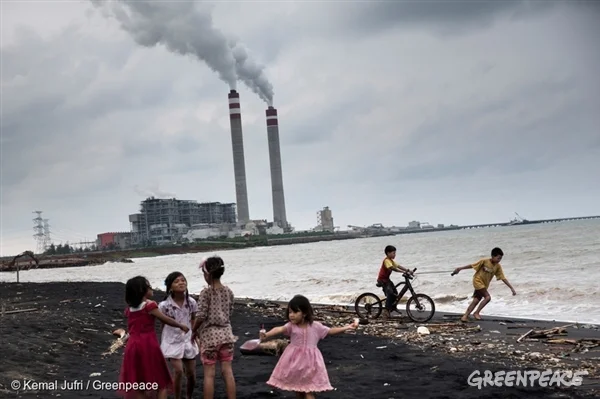 Children playing near a coal plant in Central Java