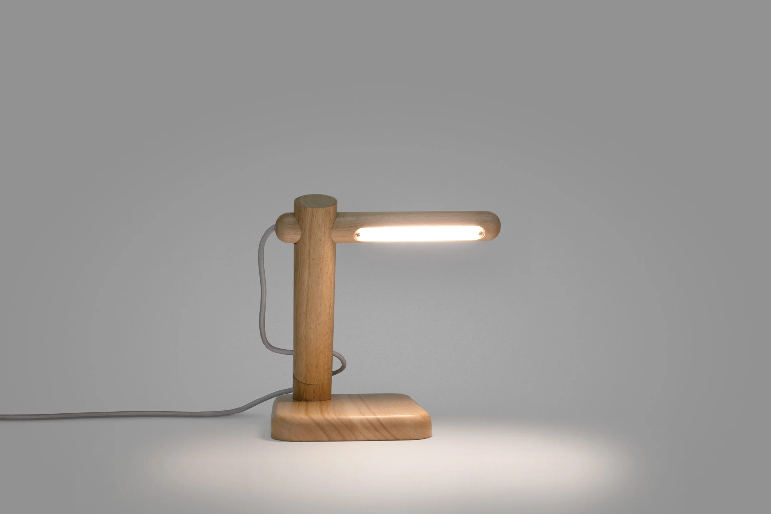 Duple Lamp Client: Fab 2014 The Duple is a compact, sculptural wooden lamp that is equally charming sitting on a desk or mounted on the wall. Like the rest of Fab's Nordic collection, it is designed for easy assembly.