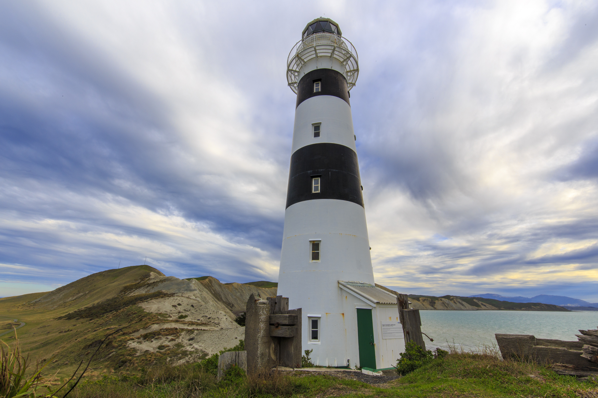 The lighthouse in its rugged setting.