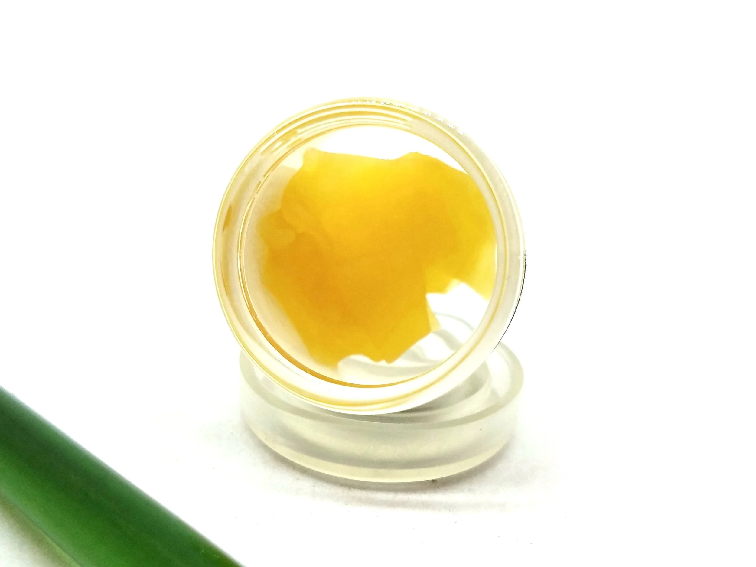 Tropical Trainwreck distillate shatter produced by Winberry Farms