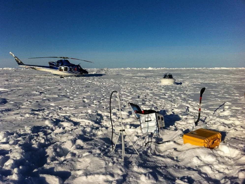 Ice Mass Balance Buoy (foreground) and Wave Buoy (background).
