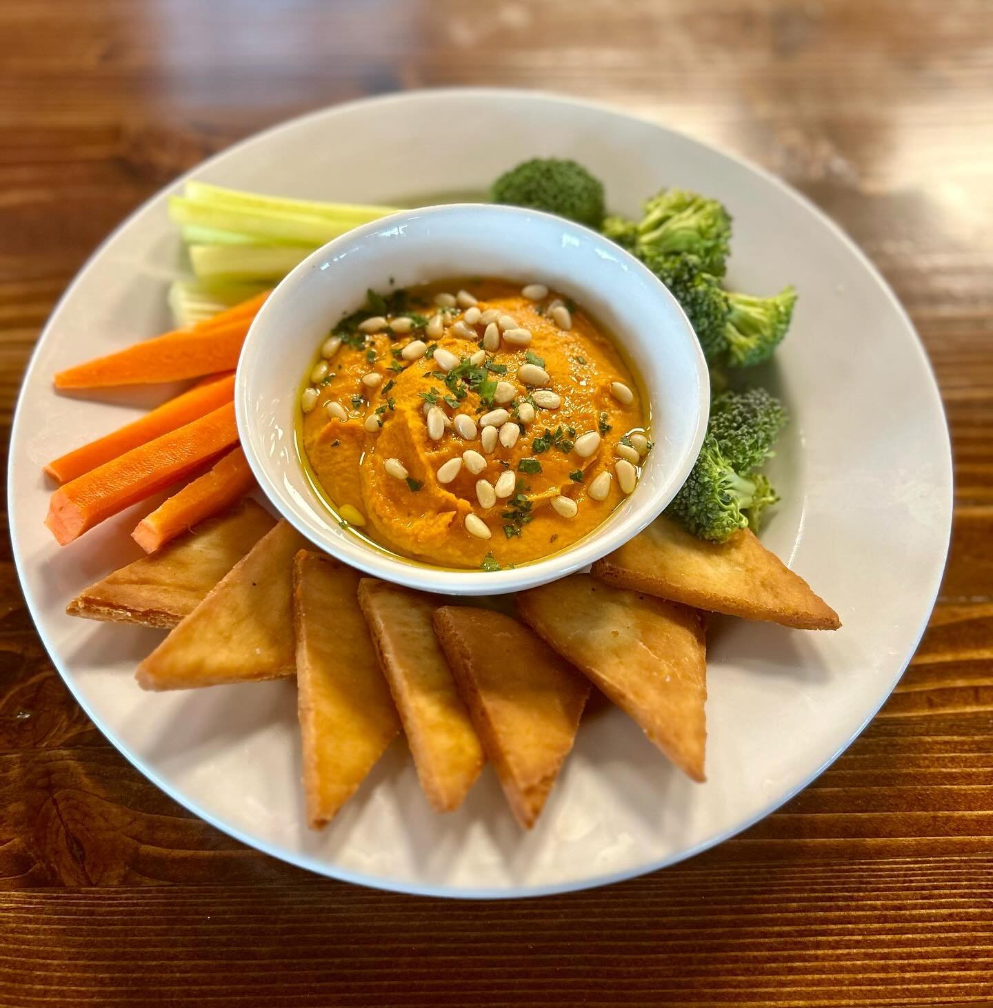 Littleton on Santa Fe Kitchen Special - Roasted red pepper hummus drizzled with garlic oil &amp; pine nuts, served with veggies &amp; fried pita!
Only available at our Littleton location at 5350 S Santa Fe Drive, Unit F, Littleton CO 80120.