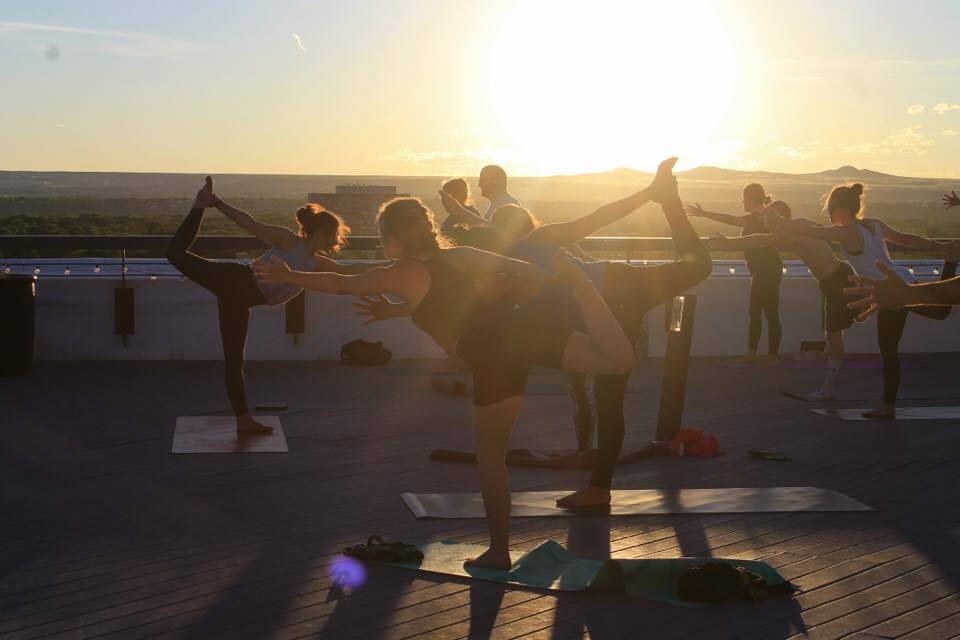 Group Doing Yoga in one of the best yoga retreats in New Mexico