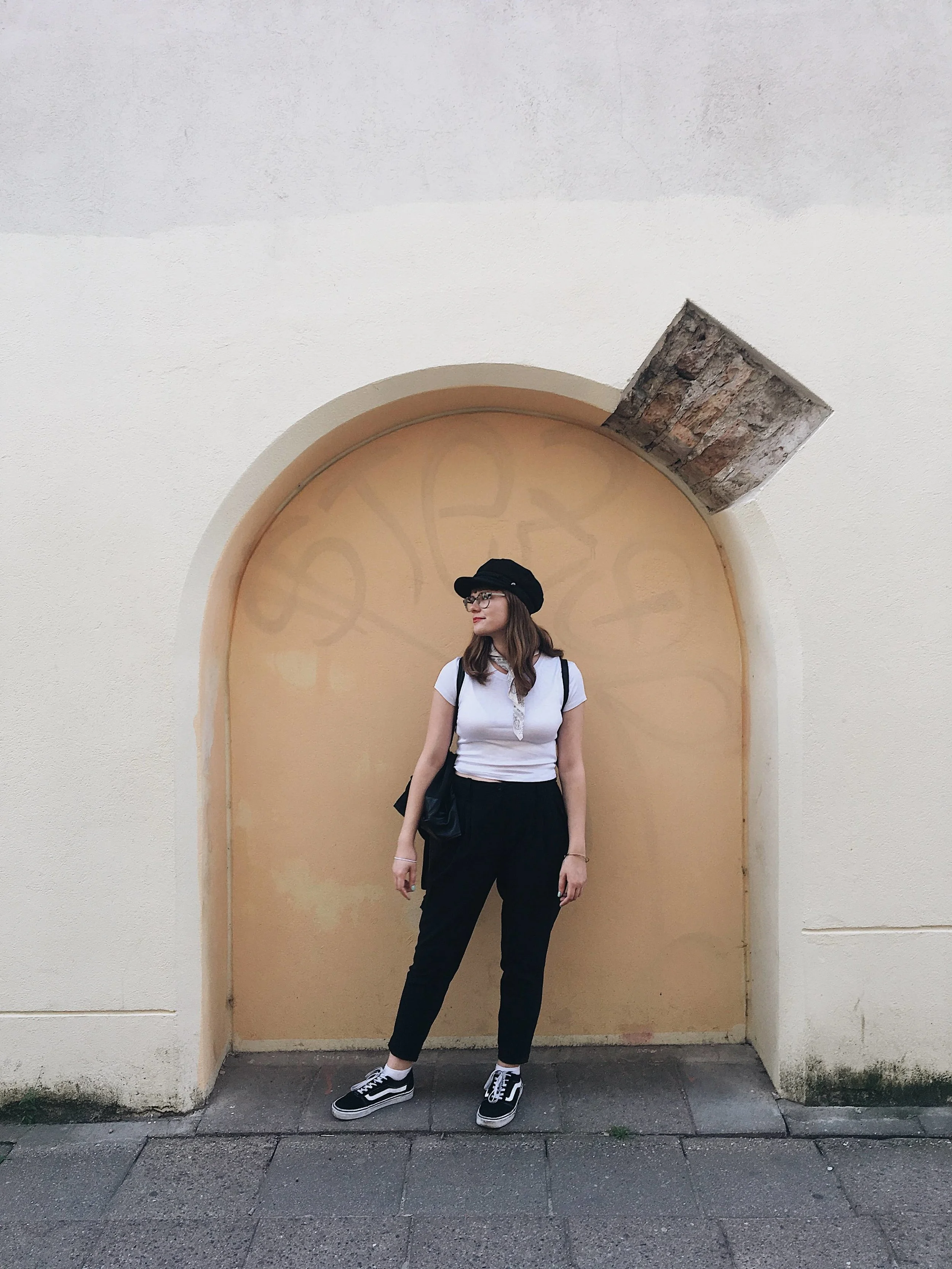 The only thing that survived the airplane trip in this photo is my conductor hat and my favorite vans. The comfy harem-style pants were a generous gift from my mom’s friend and a simple cropped tee I bought at the Forever 21 equivalent in Lithuania.
