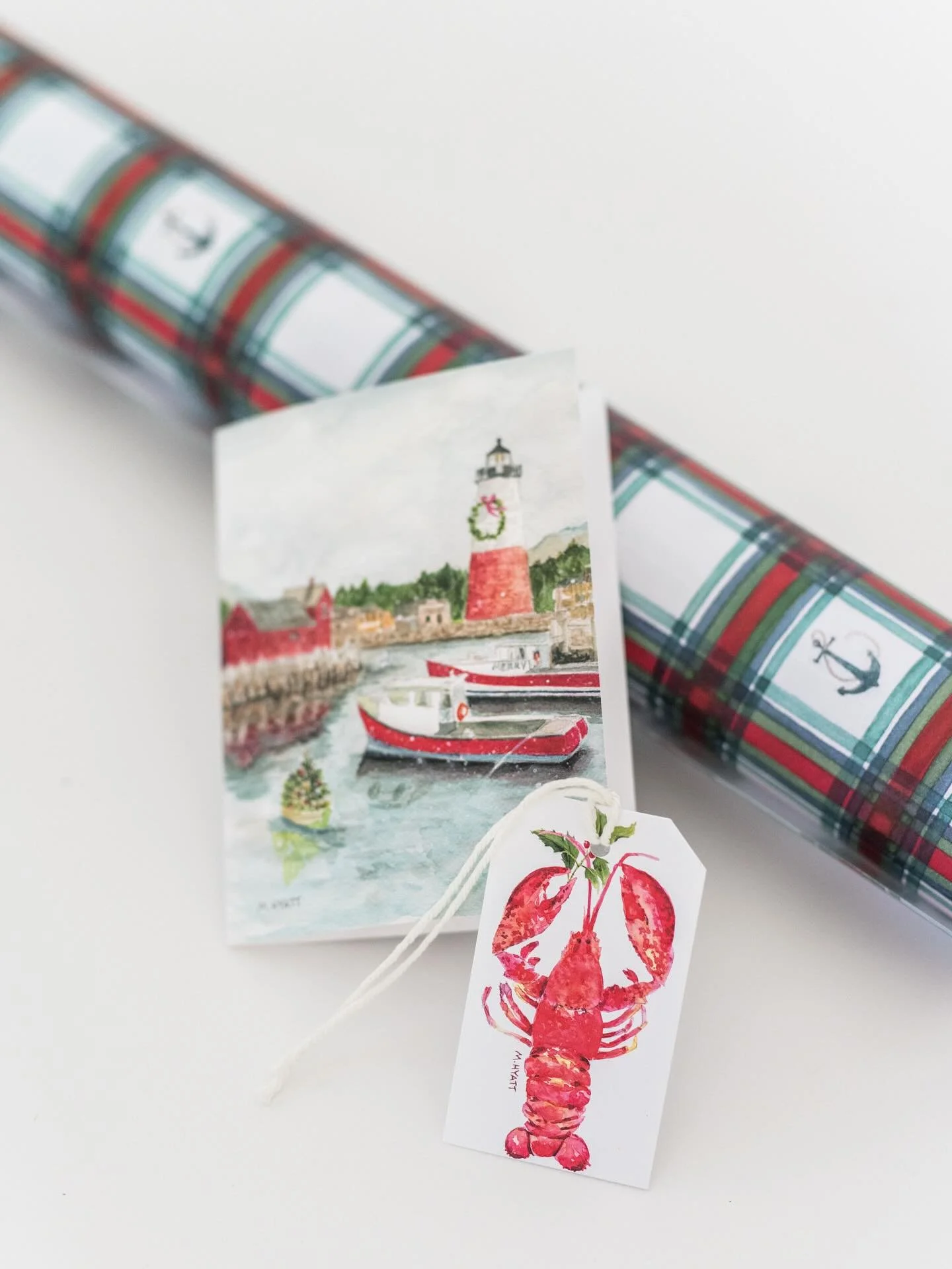It&rsquo;s beginning to look a lot like Christmas around here ! Temperatures may be in the 70s and 80s but Last week my top seller with wholesale clients was our coastal tartan wrapping paper! The lobster tags and the Christmas harbor greeting card w