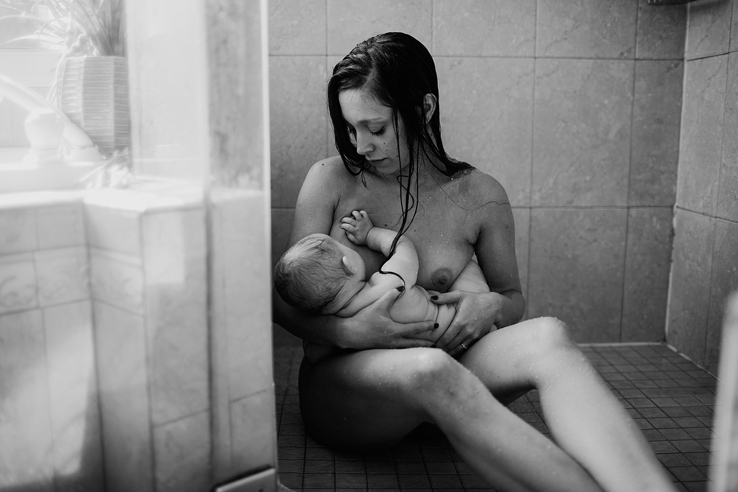 Intimate motherhood photography taken by Emily Shepherd of Emmy Shepherd Photography, LLC.