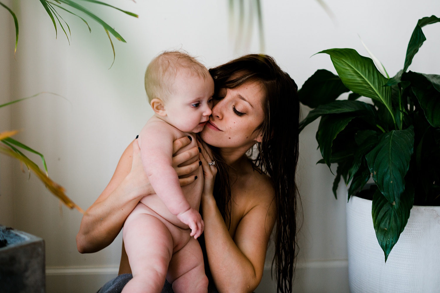 Intimate motherhood photography taken by Emily Shepherd of Emmy Shepherd Photography, LLC.