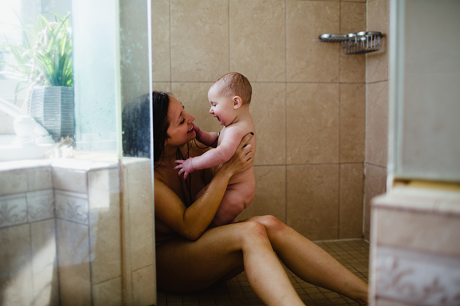 Intimate motherhood photography taken by Emily Shepherd of Emmy Shepherd Photography, LLC.