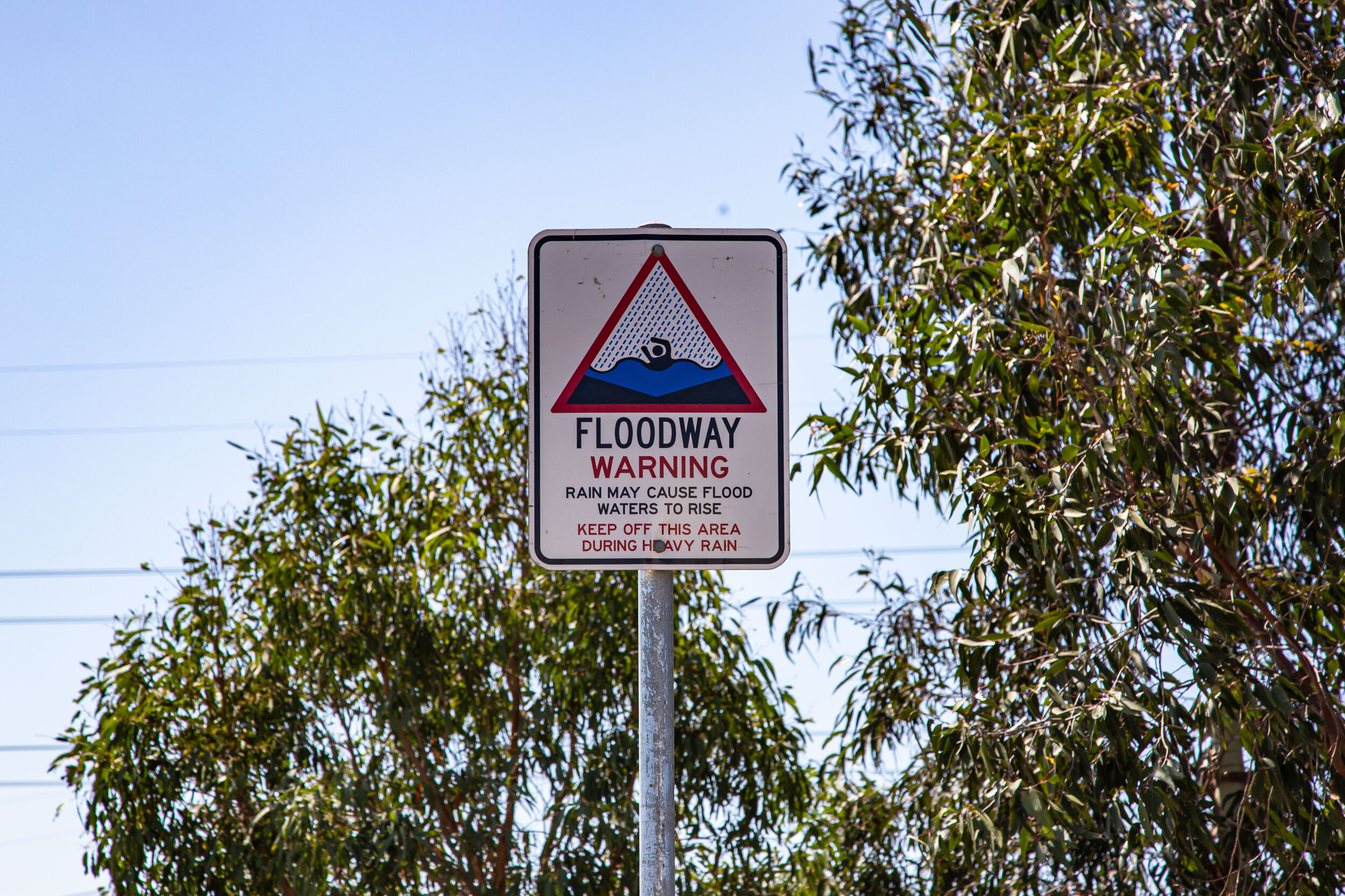 Flooding is usually out of sight and out of mind, like this sign.