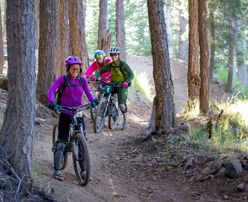 women-cycling-on-trail.jpg