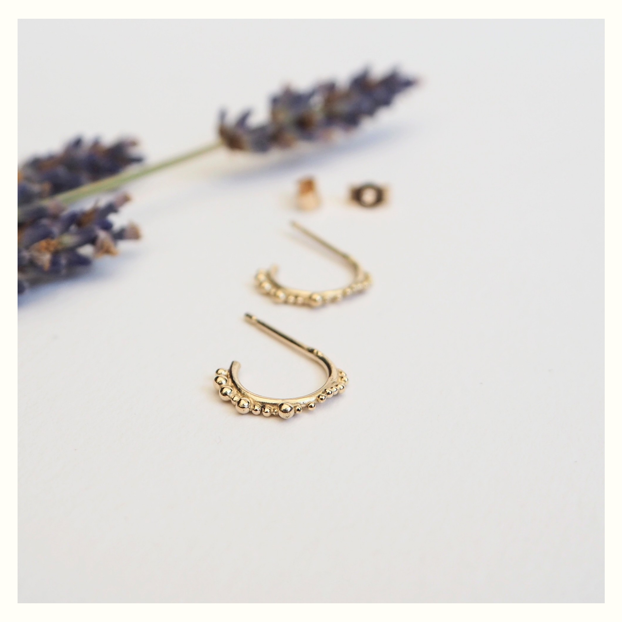 Sol Ear Huggers in recycled gold