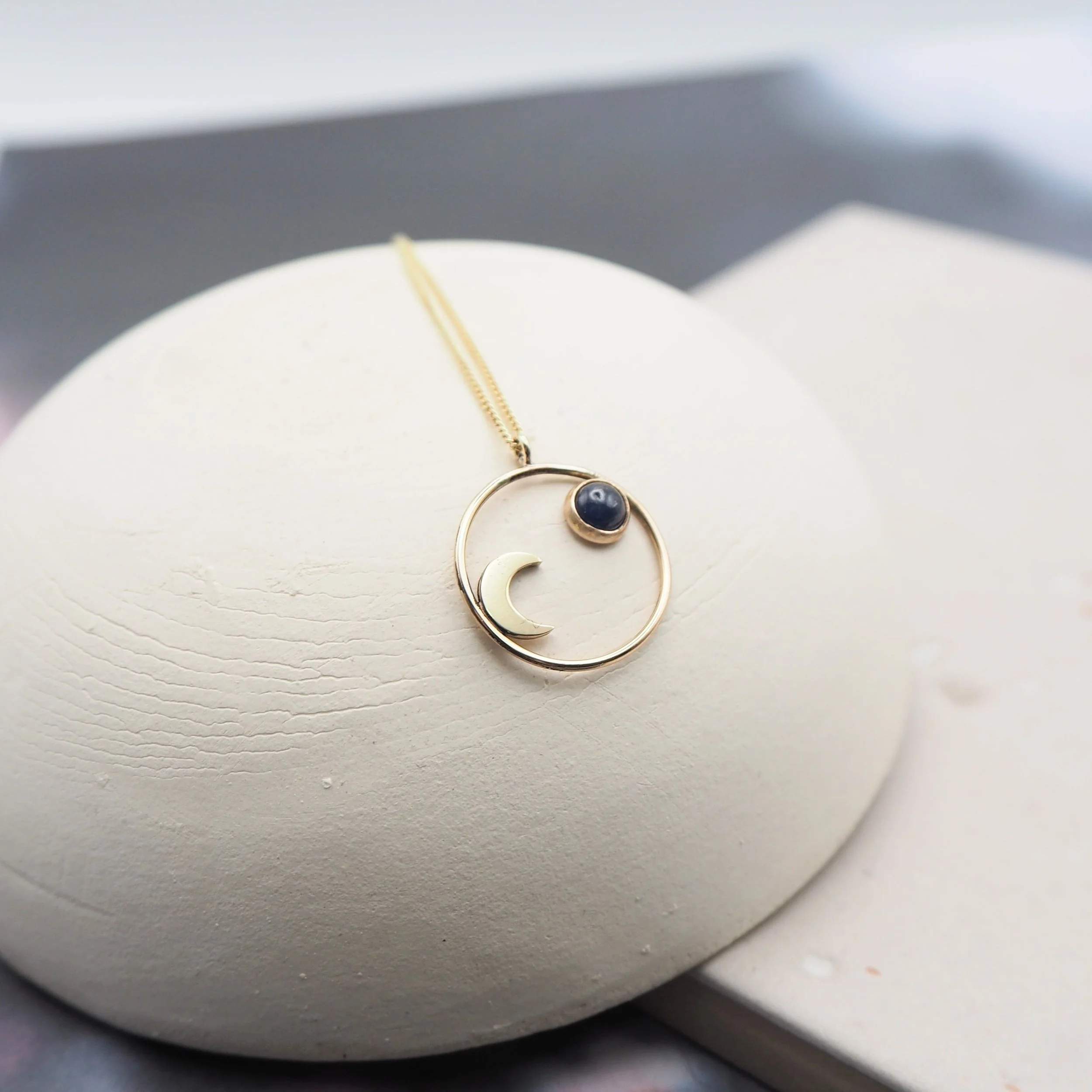 Recycled Gold Pendant Featuring Ethically sourced sapphire  and Crescent Moon