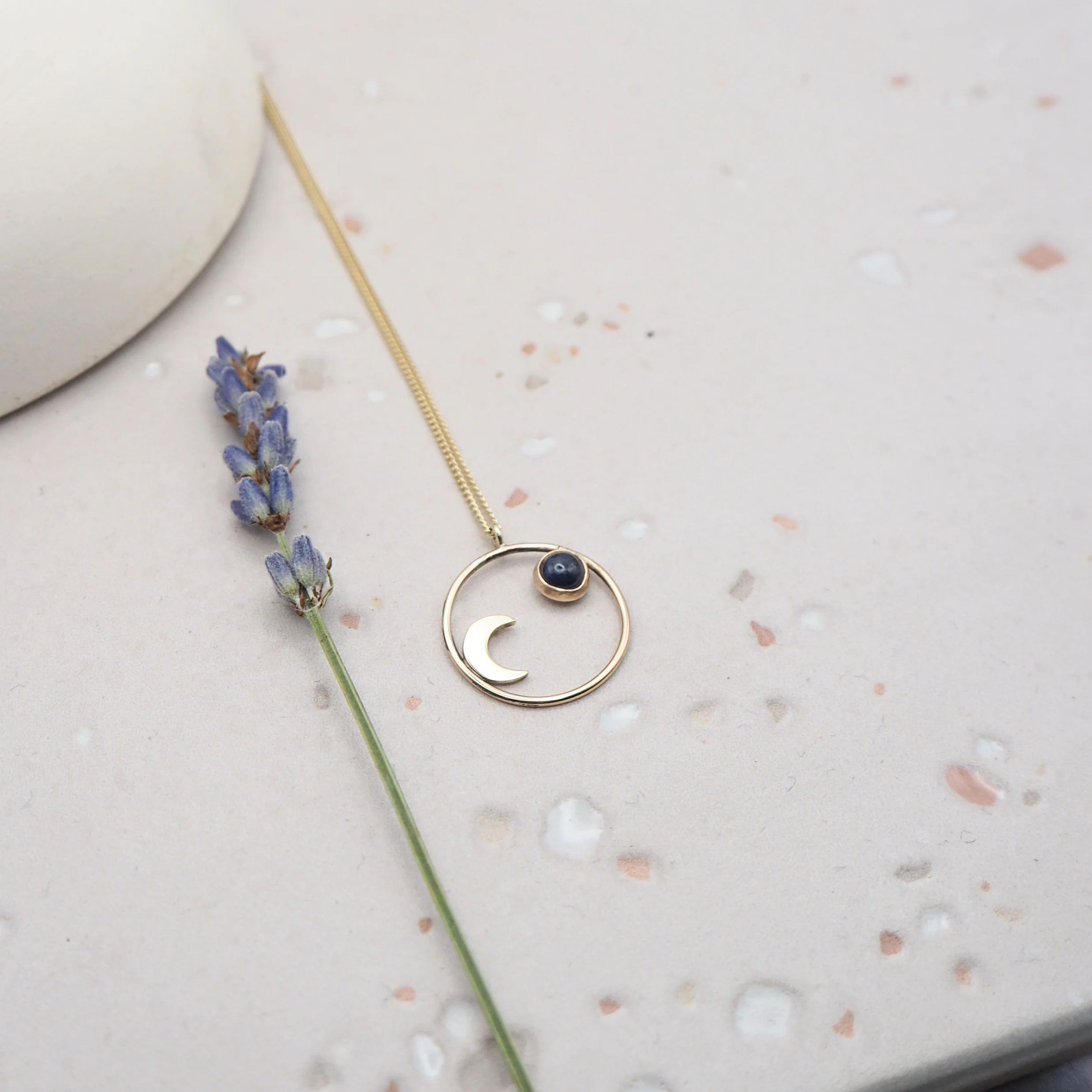 Recycled Gold Pendant Featuring a Sapphire gemstone and Crescent Moon