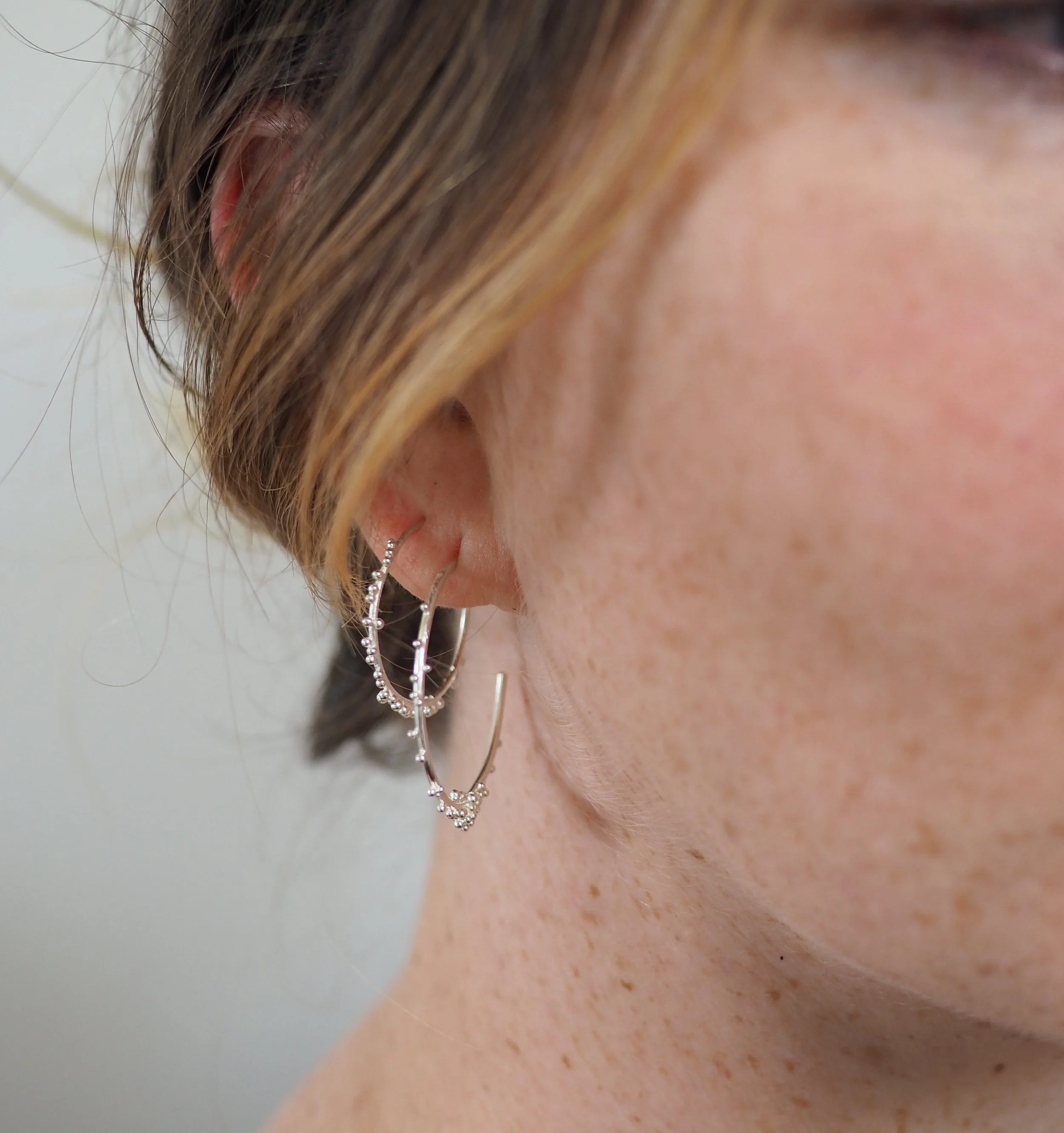 Recycled Silver Hoop Earrings, Large size with granulated details being worn
