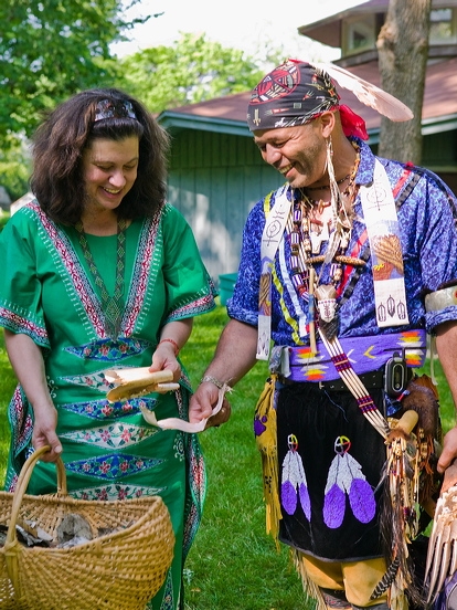 JoAnne Spies and Shawn Stevens at "Sounding the River' Pumpkin Hollow basket has prayers from audience written on birch bark photo: Keith Emerling