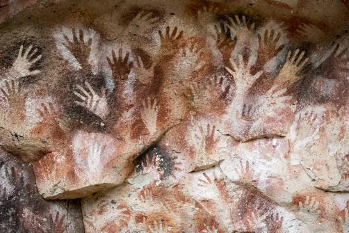 Cueva de las Manos is a cave or a series of caves located in the province of Santa Cruz, Argentina, 163 km south of the town of Perito Moreno. It is famous for the paintings of hands. The art in the cave dates from 13,000 to 9,000 years ago.