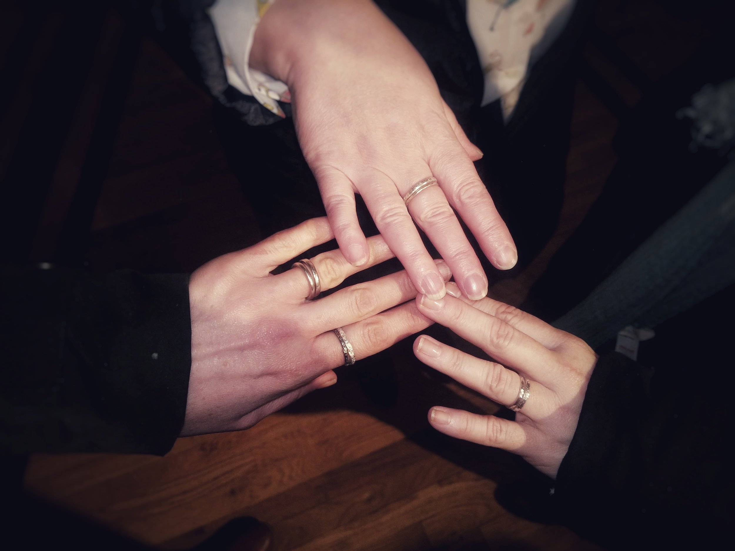 Participants wearing finished handmade silver rings