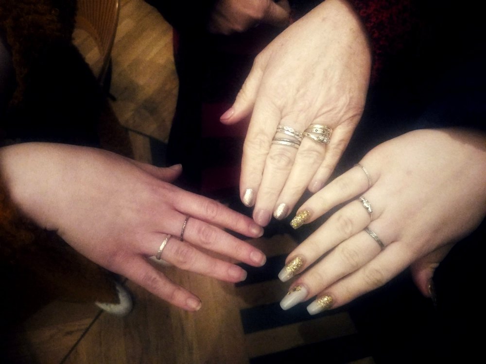 Participants wearing finished handmade silver rings