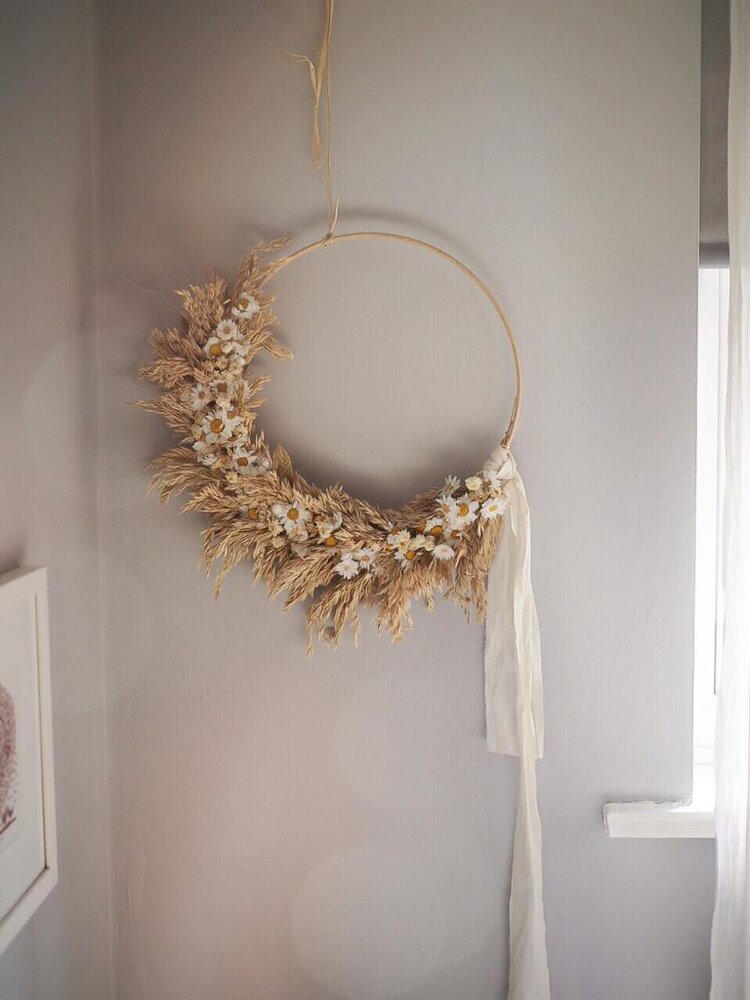 wooden based dried flower wreaath.jpeg