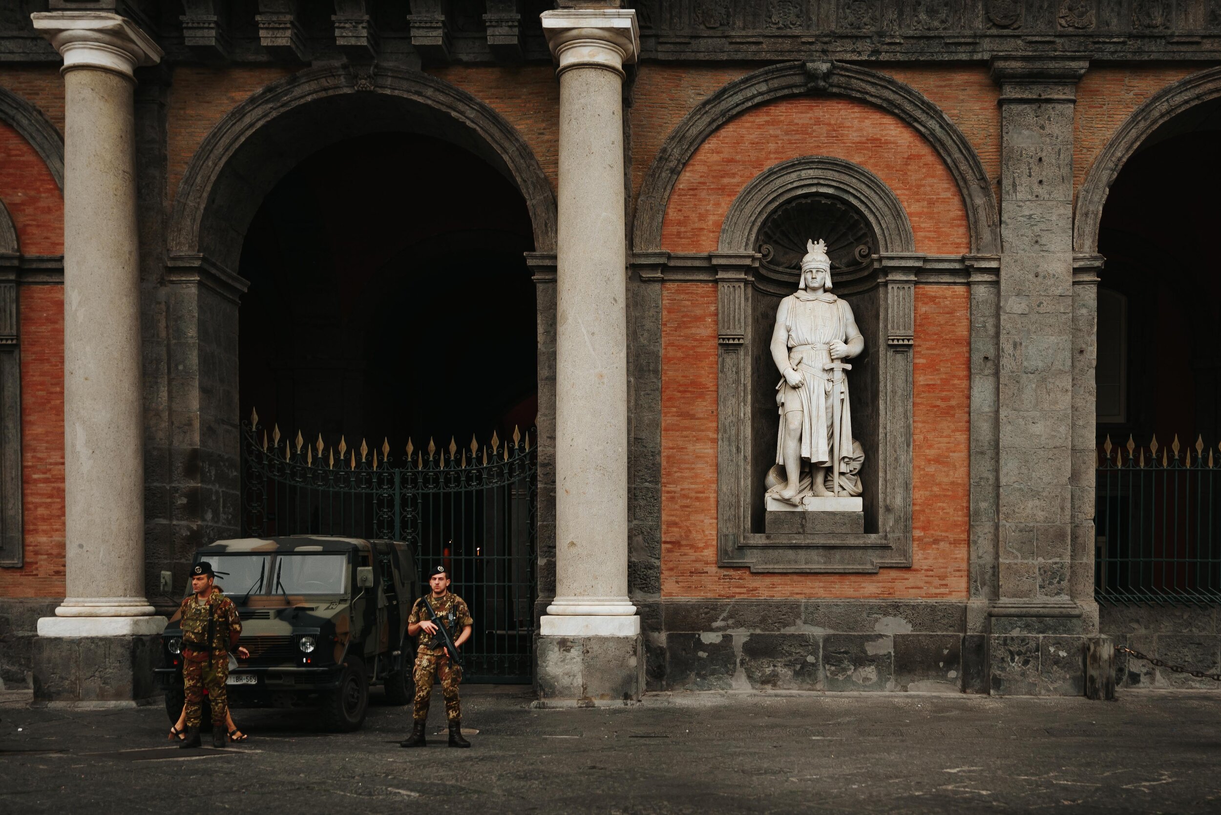  Three men stand guard - Royal Palace. Naples, Italy 