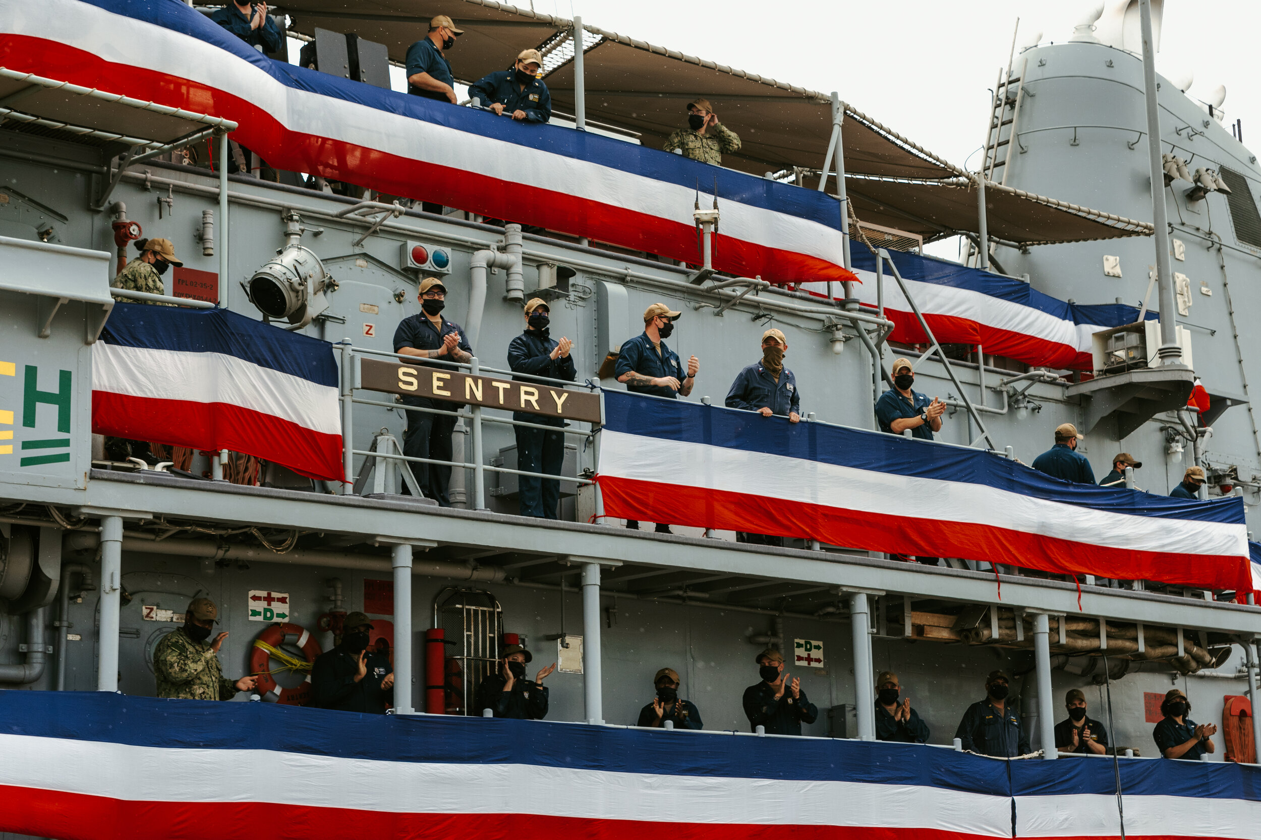 Sailors Cheer For Their Former Commander