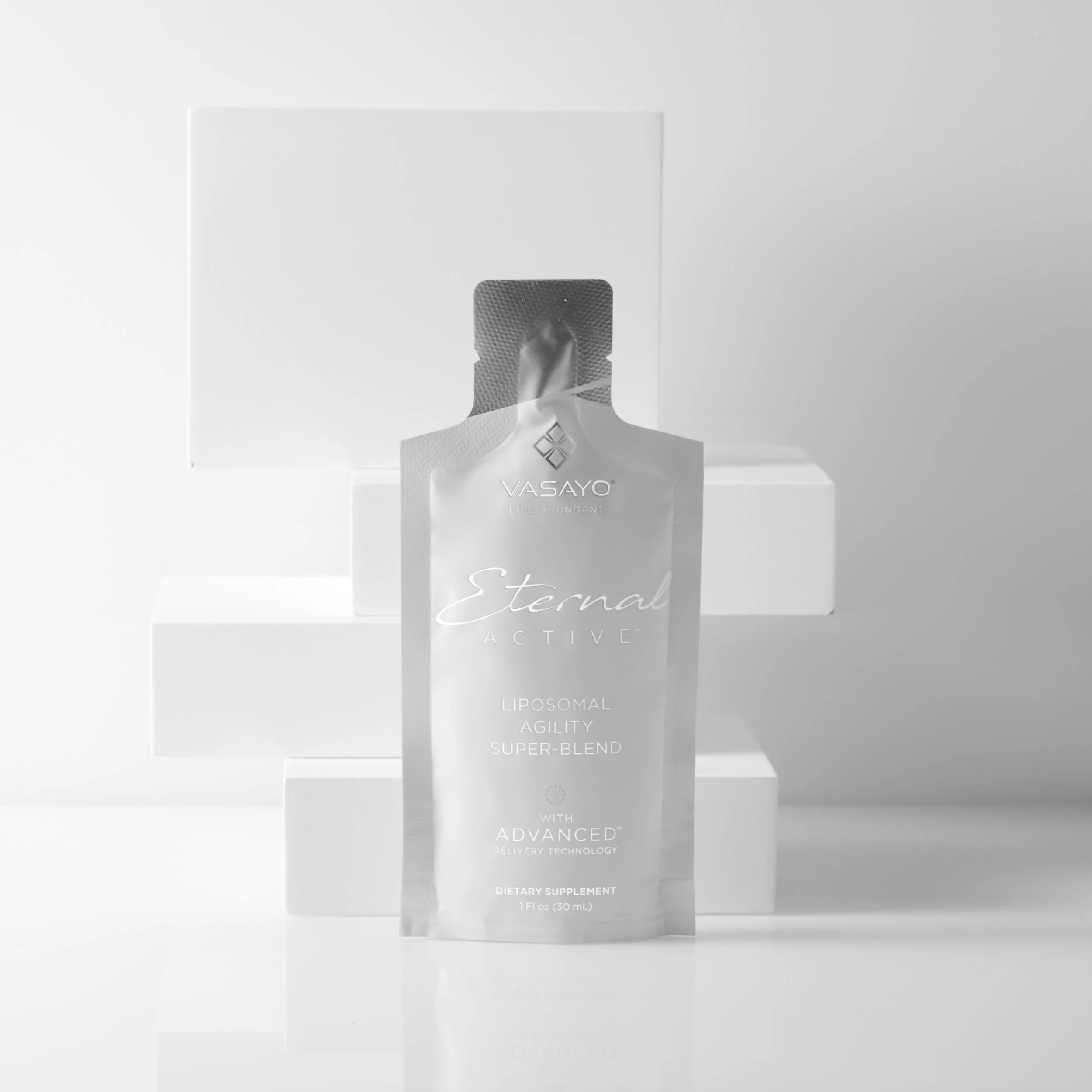 A silver dietary supplement pouch labeled 'Vasayo Sternal Active' with the words 'Liposomal Agility Super-Blend' on a white background with white rectangular props.