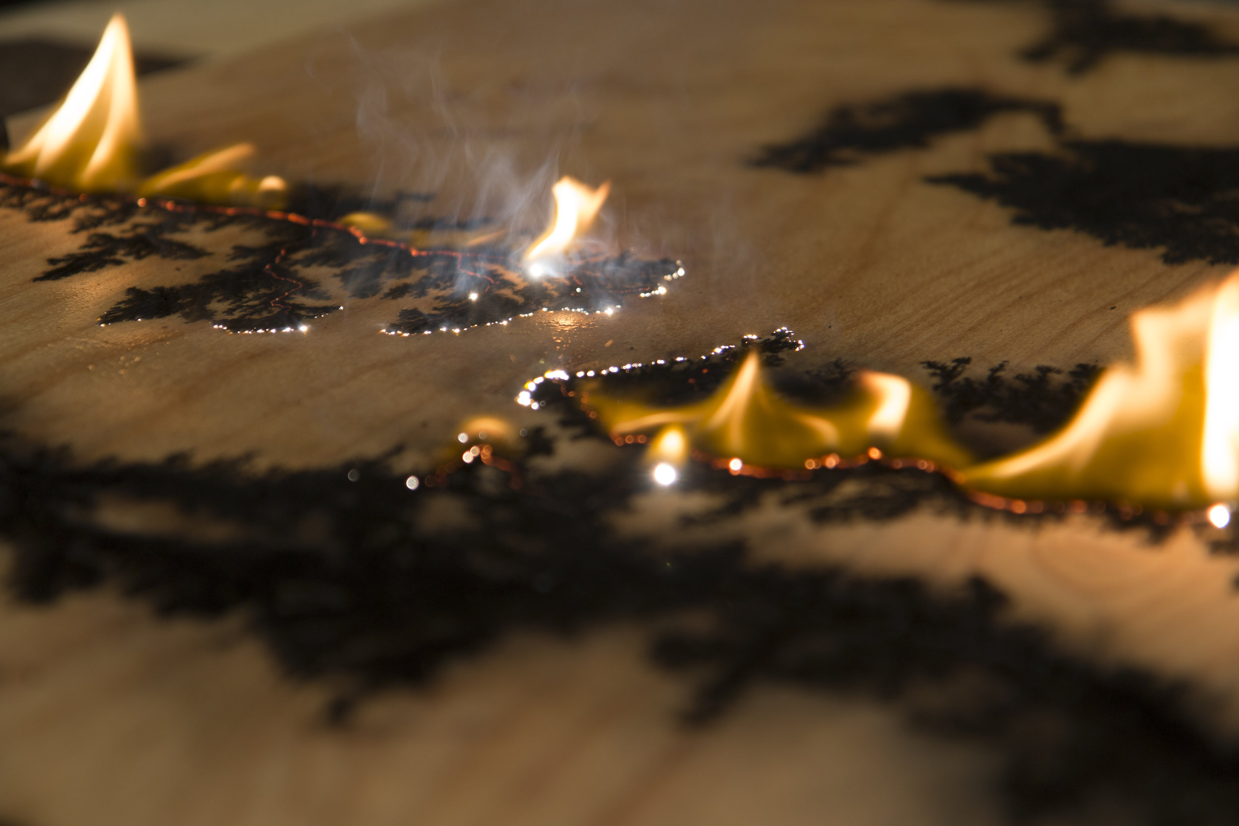 wood burning with lightning