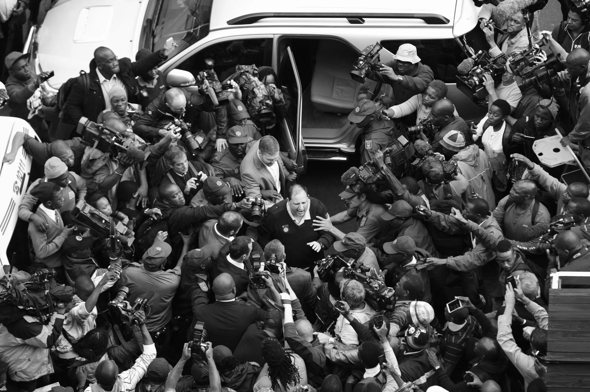 National and international members of the media all trying to get a shot of Oscar leaving the Pretoria High Court after the first day of the trial. 