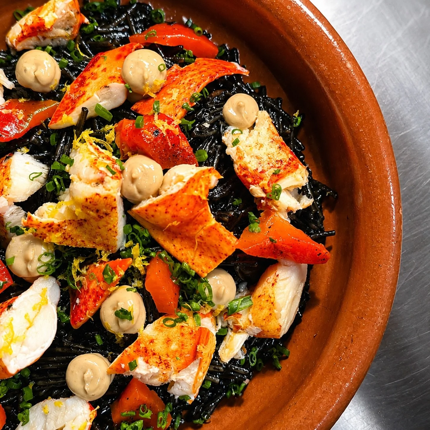 The definitive dish of the summer debuts today, July 4th ☀️: Maine Lobster &amp; Squid ink Fideos.

Squid ink noodles paired with succulent Maine lobster, our signature housemade chorizo, roasted red peppers, and an exquisite green crab 🦀 aioli. Cra