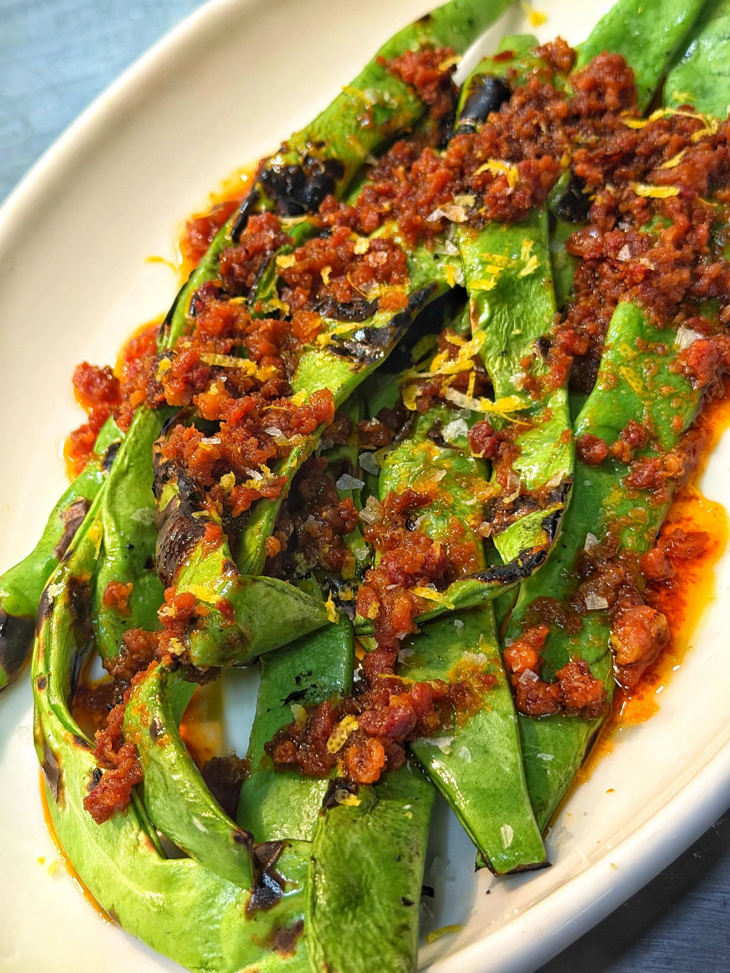 Grilled @bumblerootorganicfarm Romano Beans &bull; Chaval Iberian XO Sauce &bull; Lemon 
#eatyourvegetables #local #portlanmaine