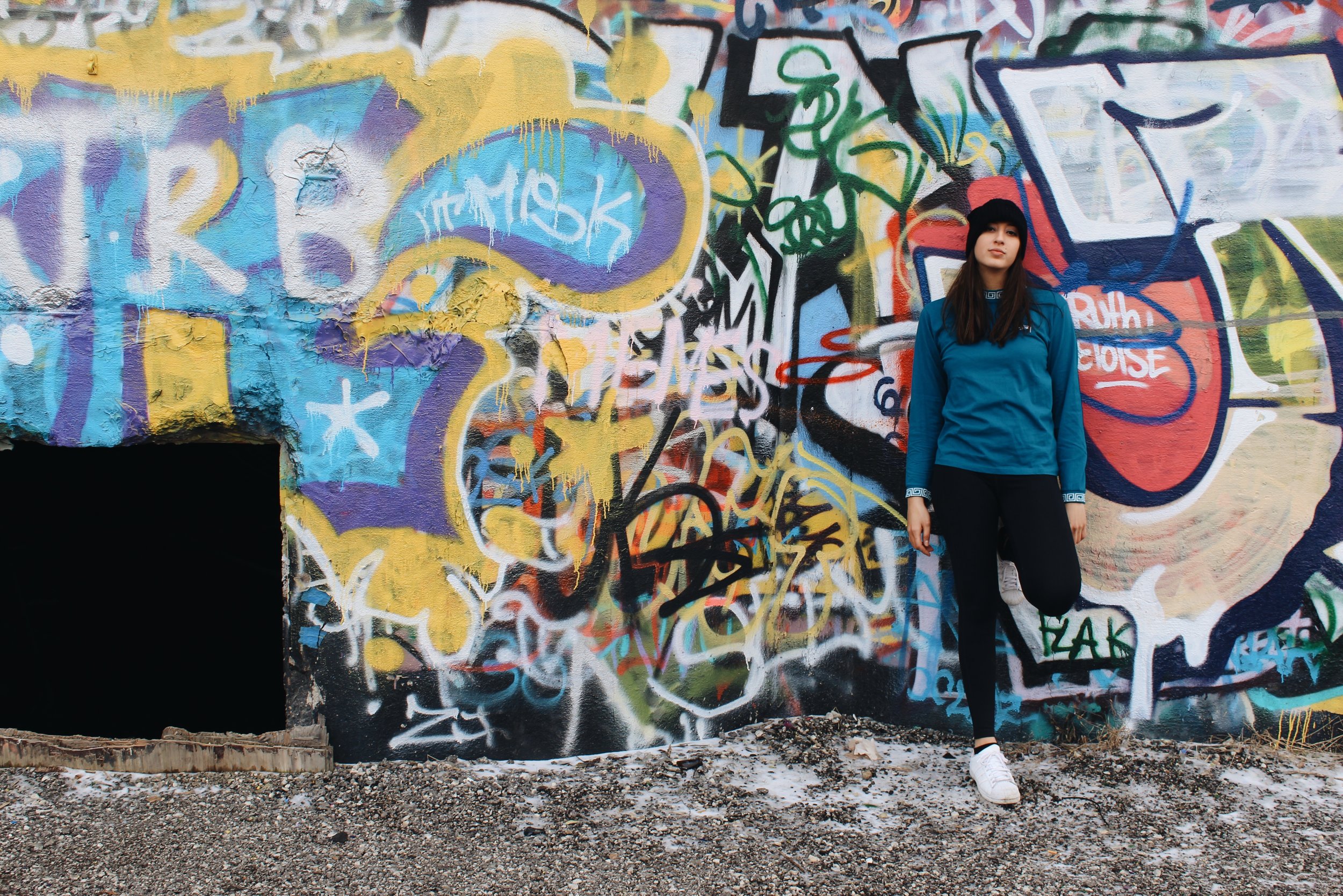  Amanda wears beanie, Urban Outfitters; blue long sleeve, Stussy; leggings and shoes styled as before. 