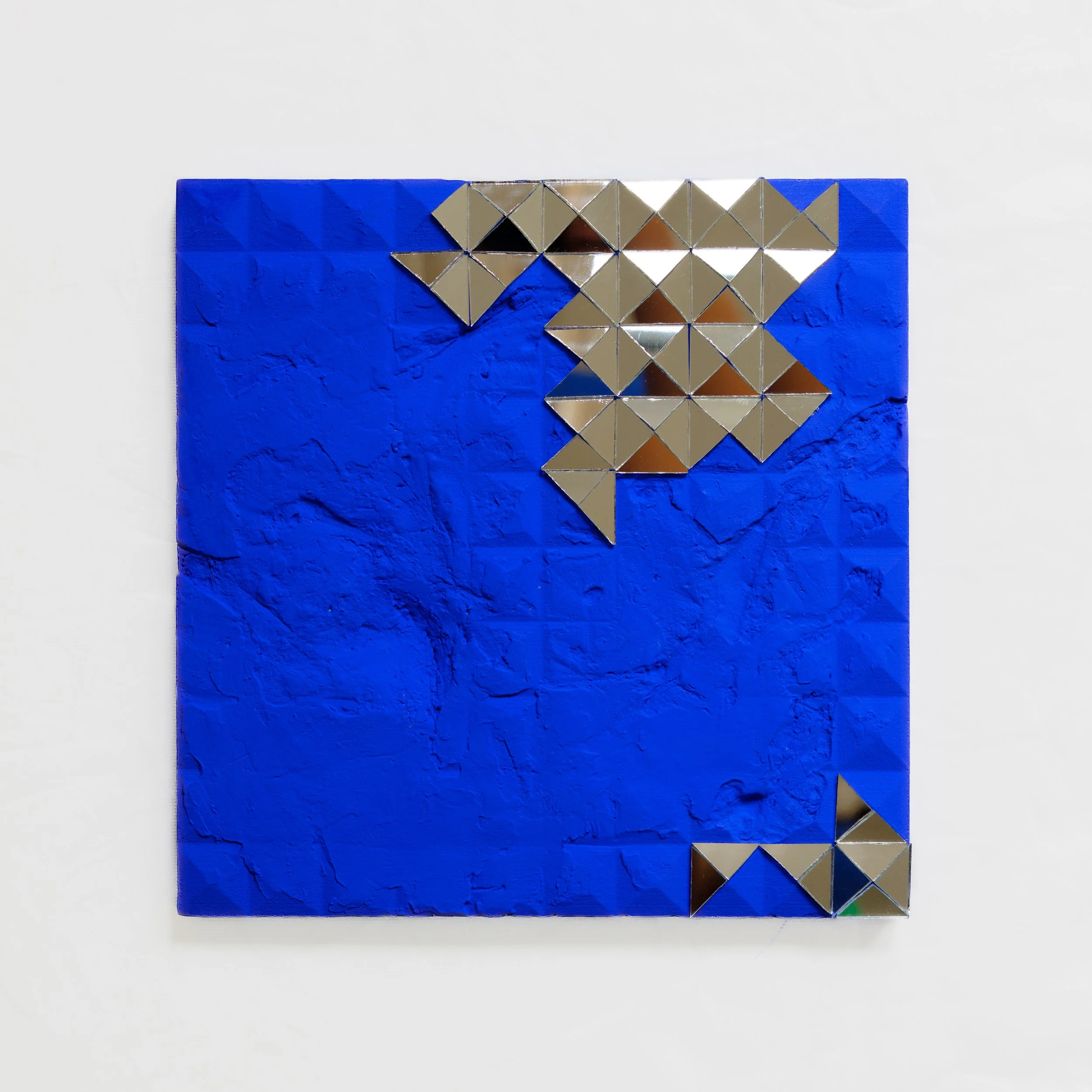 Blue #5, Mirror on plaster, 2025 – 21x21 cm