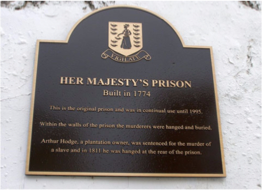 HER MAJESTY'S PRISON This prison is Road Town's oldest building and has been the scene to historic events such as the execution of Arthur W. Hodge, a plantation owner, on 8th May 1811, for having murdered of a slave.