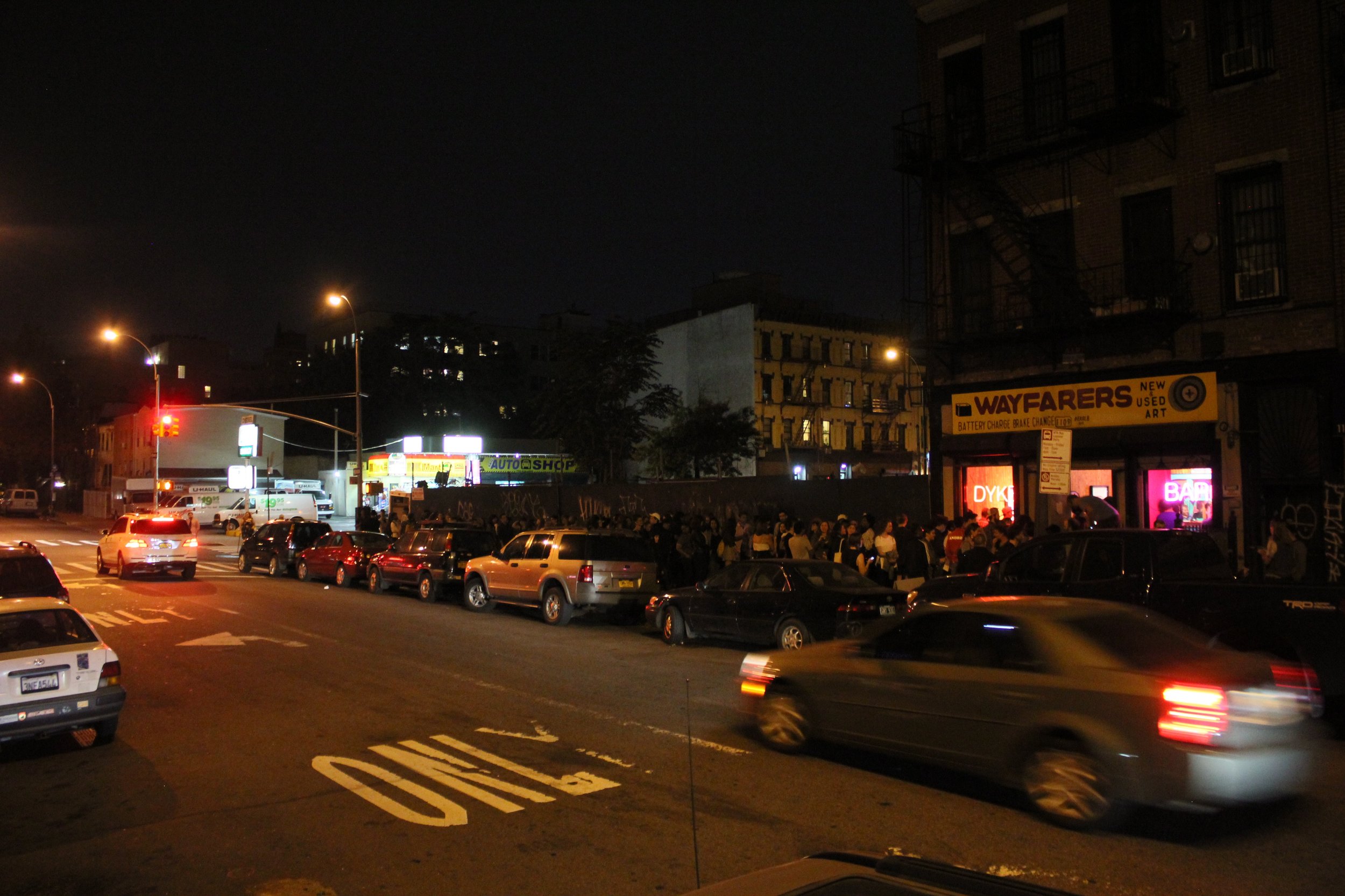 Line forming for Eulogy For The Dyke Bar at Wayfarers Gallery